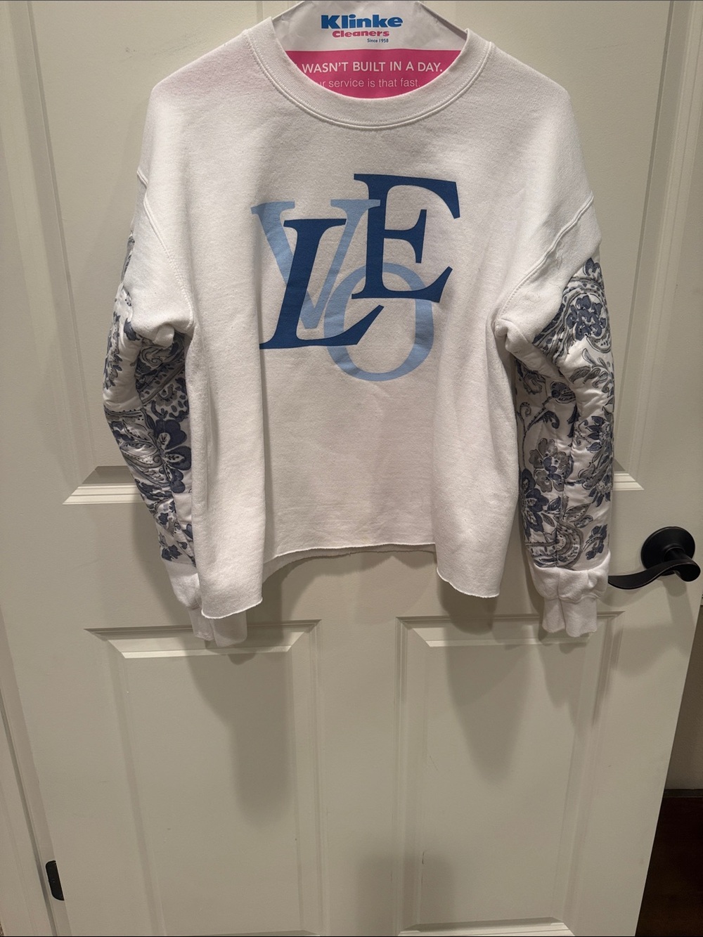 One of a kind upcycled Inspired Brand size small sweatshirt w quilted sleeves